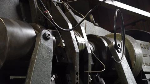 Cam slides and lever systems moving on a machine for the production of articles  Stock Footage 106734726