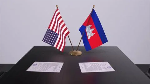 Cambodia and USA at negotiating table. Business and politics 3D illustration. イラスト素材