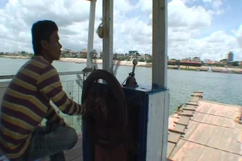 CAMBODIA-FERRY-CAPTAIN DRIVER Stock-Footage 771891
