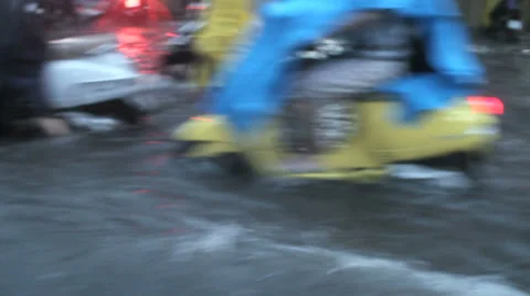 Cambodia flood mopeds Video stock 33861874