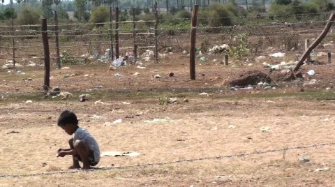 Cambodian boy in trash Stock Footage 853158