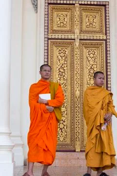Cambodian Buddhist monks posing, King's palace, Phnom Penh. Stock Photos