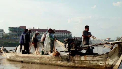 Cambodian Fishermen pulling in their Nets Stock Footage 74193500
