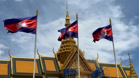 Cambodian flags in front of the iconic Royal Palace, Phnom Penh, Cambodia 4K Stock Footage 199621536