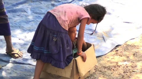 Cambodian kids in box Stock Footage