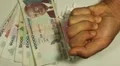 Cambodian Riel KHR, Counting Drugs and Money, Health Care, Colorful Pills HD Footage