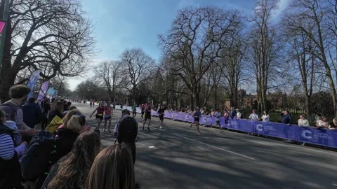 Cambridge Half Marathon 2025: Runner collapses Stock Footage 313953799