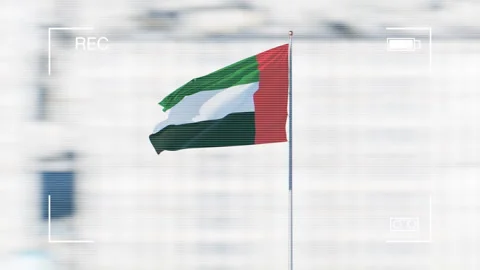 Camcoder flyover of the beautiful waving UAE flag in the sky Stock Footage 148626000
