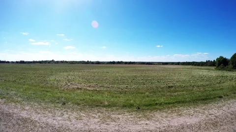 Camcorder between the wheels of the car. The camera flies over the road. The cam Stock Footage 53505161
