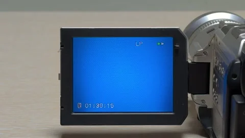 Camcorder Fast-Forwarding Triggers an Anxious, High-Pitched Mechanical Whir Stock Footage 329087325