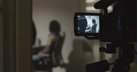 Camcorder Screen, Recording Long Haired Man And Police In Interrogation Room Stock Footage 273177444