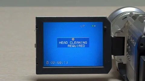 Camcorder Slow Rewind Triggers a Sluggish, Stuttering Mechanical Click Video stock 329087341