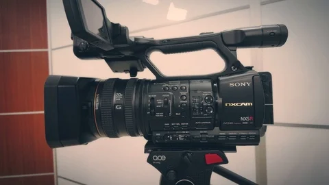 Camcorder in the studio 4K Video Vídeo Stock 86422491