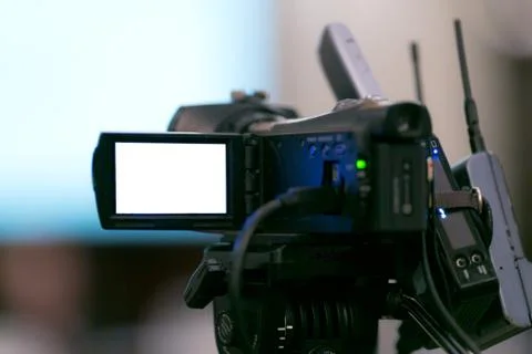 Camcorder on the tripod with audio transmitter Stock Photos