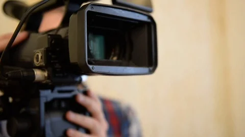 The camcorder while reporting on a tripod Video stock 70685804