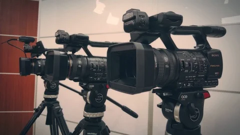 Camcorders camera in the studio 4K Video Vídeo Stock 86422453