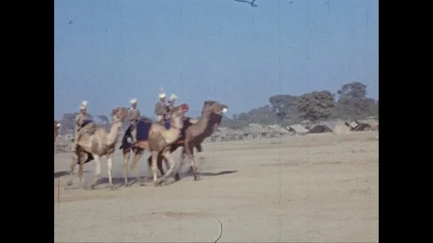 Camel cavalry march in formation through the camp, Central Asia Stock Footage 131526132