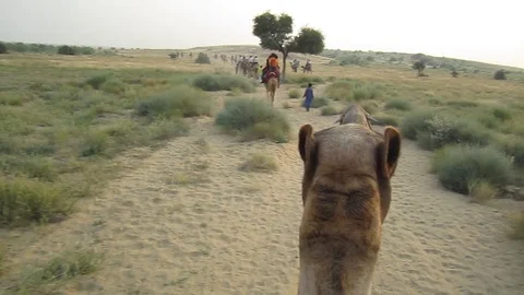 Camel Riding in Thor Deseart Stock Footage 121026418