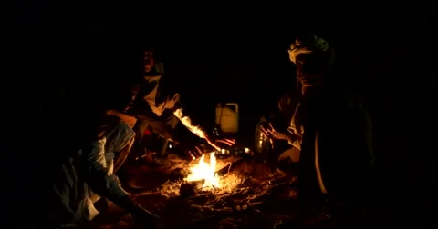 Camel trader at night camp fire  during Camel Fair in Pushkar, India.. Stock-Footage 58337237
