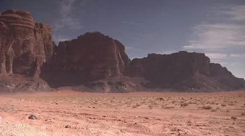 Camel walking in desert - LONGSHOT Stock Footage 22025685