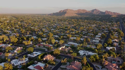 Camelback Mountain at Sunset overlooking Phoenix Arizona desert community. Stock Footage 135535046
