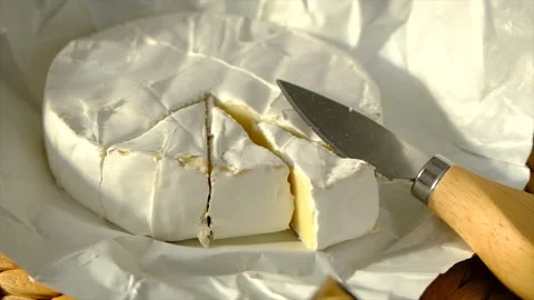 Camembert cheese on the table. Selective focus. Stock Footage 224470744