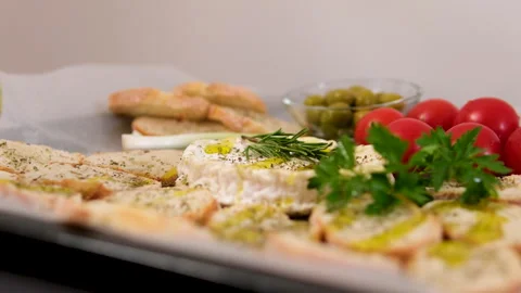 Camembert, Cooking process, Step by step worker at a craft cheese factory turns Stock Footage 302819259