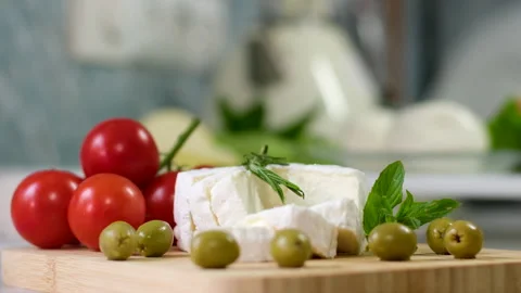 Camembert, Cooking process, Step by step worker at a craft cheese factory turns Stock Footage 302819791