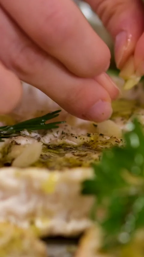Camembert, Cooking process, Step by step worker at a craft cheese factory turns Stock Footage 303854085