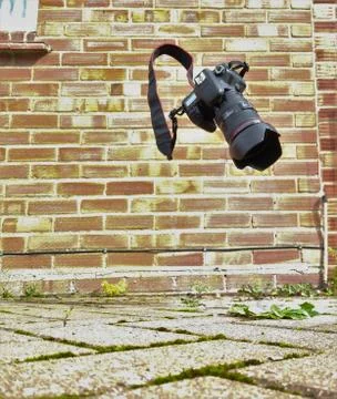 Camera accident falling on to hard surface Stock Photos