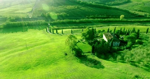 Camera aerial pan at sunset time with hillside view at Tuscany valley landscape Stock Footage 72362702