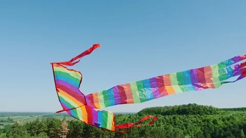 Camera is aimed at a kite in the blue sky close-up Stock Footage 111732587