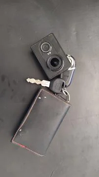 Camera and car keys Stock Photos