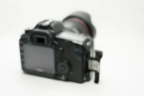 Camera and lens with white background Stock Photos