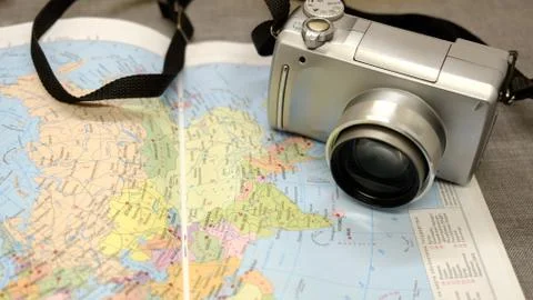 Camera and a modern map of the world Stockfoto's