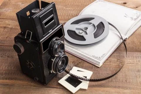 Camera and Notebook Stock Photos