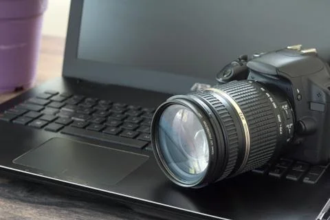 Camera and notebook Stock Photos