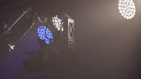Camera and spotlights at the studio motion shot Video stock 129640009