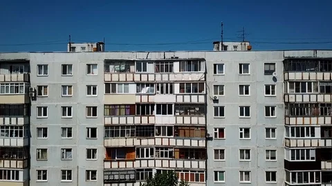 Camera approach to the balconies of a multi-storey building Stock Footage 93449126