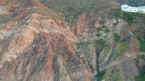 The camera is approaching a large and majestic cliff, aerial view. Tenerife Stock Footage 109262069