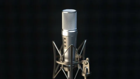 Camera approaching professional microphone in sound recording studio Stock Footage 108344493