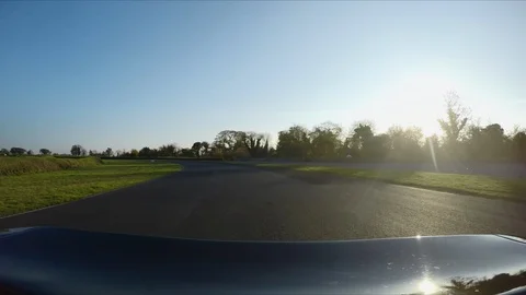 CAMERA ATTACHED TO THE BACK OF A SUPERCAR on a RACE circuit 60FPS 3 Stock Footage 127414248