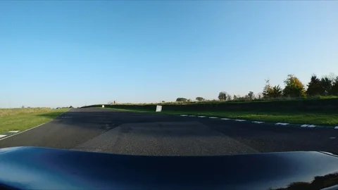 CAMERA ATTACHED TO THE BACK OF A SUPERCAR on a RACE circuit 60FPS 6 Stock Footage 127415698