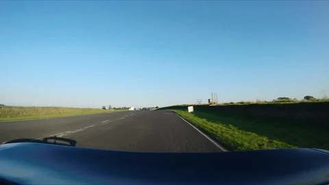 CAMERA ATTACHED TO THE BACK OF A SUPERCAR on a RACE circuit 60FPS 5 Video stock 127415820