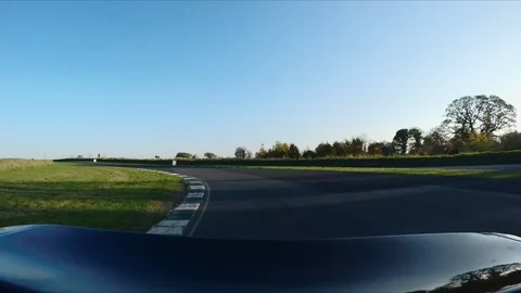 CAMERA ATTACHED TO THE BACK OF A SUPERCAR on a RACE circuit 60FPS 7 Video stock 127416690