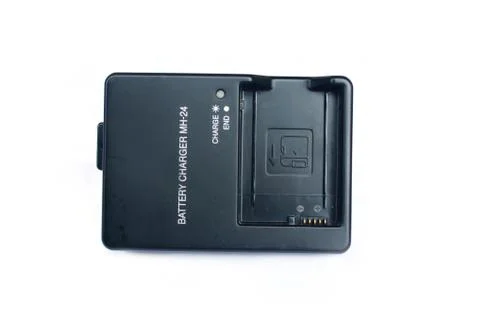 The camera battery charger Stock Photos