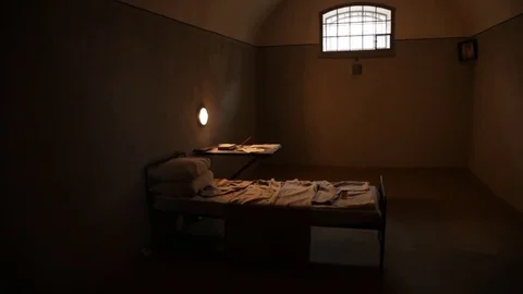 Camera with a bed and a window in the prison Stock-Footage 71625868
