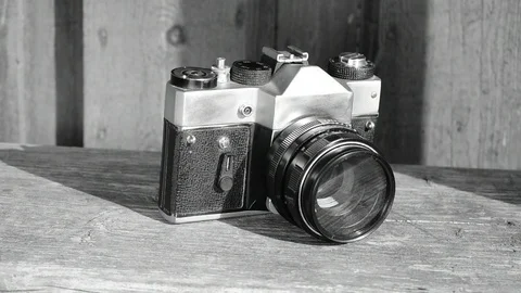 Camera on the bench black and white Stock Footage 112917950