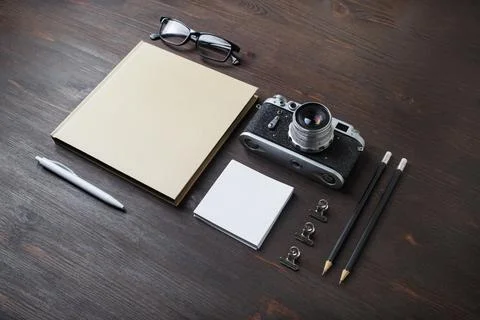 Camera, blank stationery Stock Photos