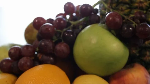 The camera from blur slides on a plate with fruit. Stock Footage 112538315
